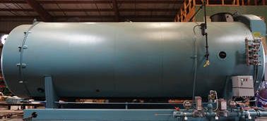 Refurbished used boiler is retrofitted to burn waste product for polymer manufacturing company
